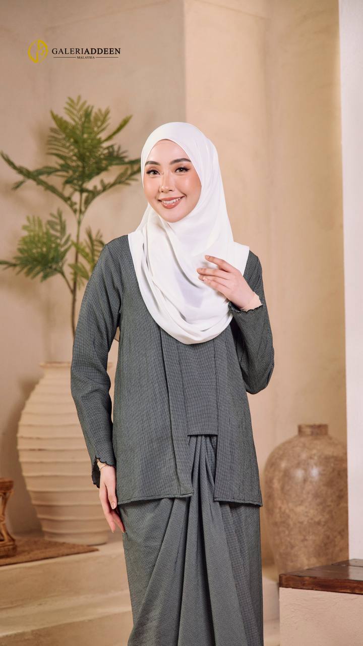 Embun in black half pose embun_bygaleriaddeen